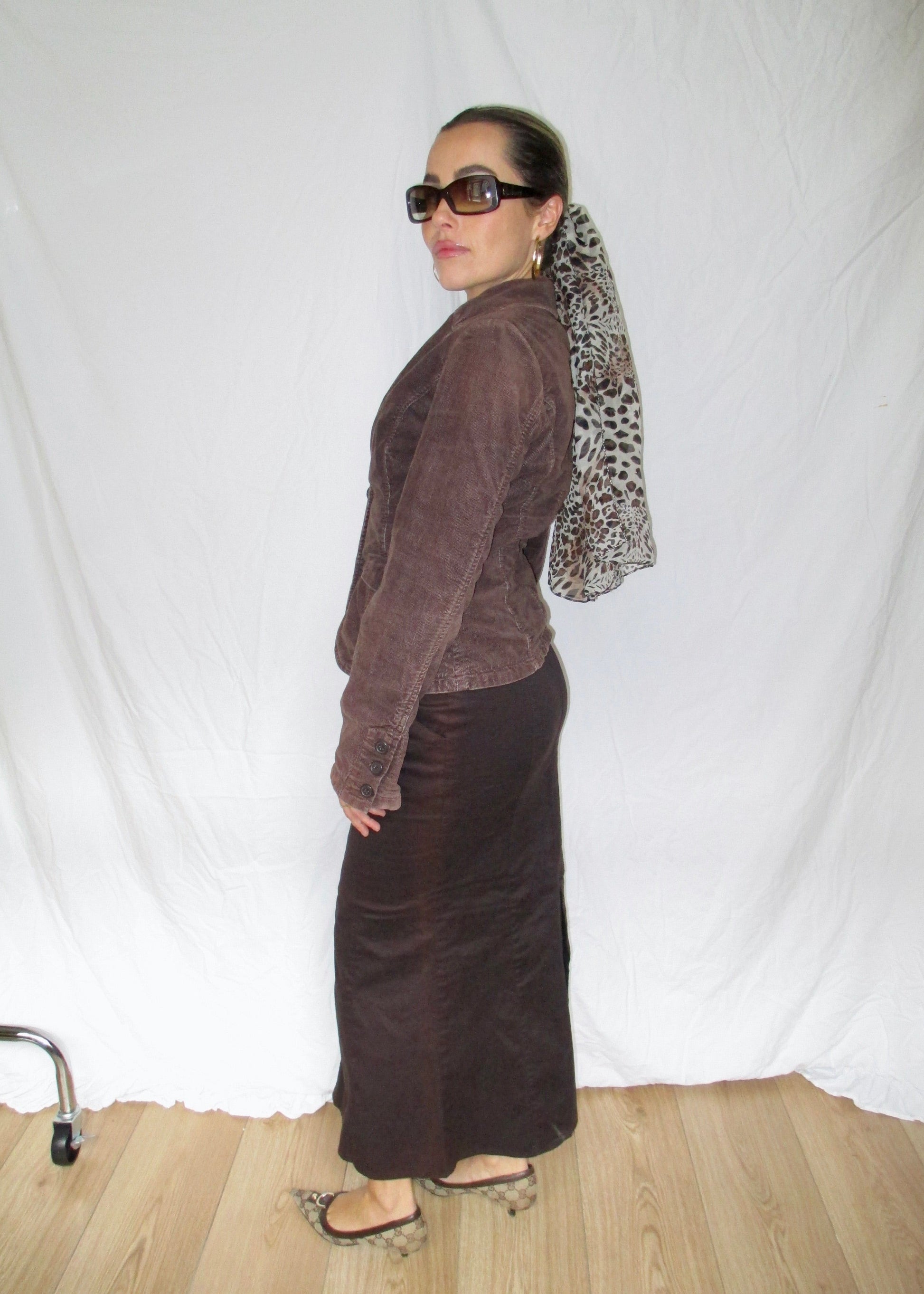 Brown maxi skirt with a clean, flattering silhouette and side pockets vintage with brown blazer 2yk gucci shoes burberry glasses headscarf