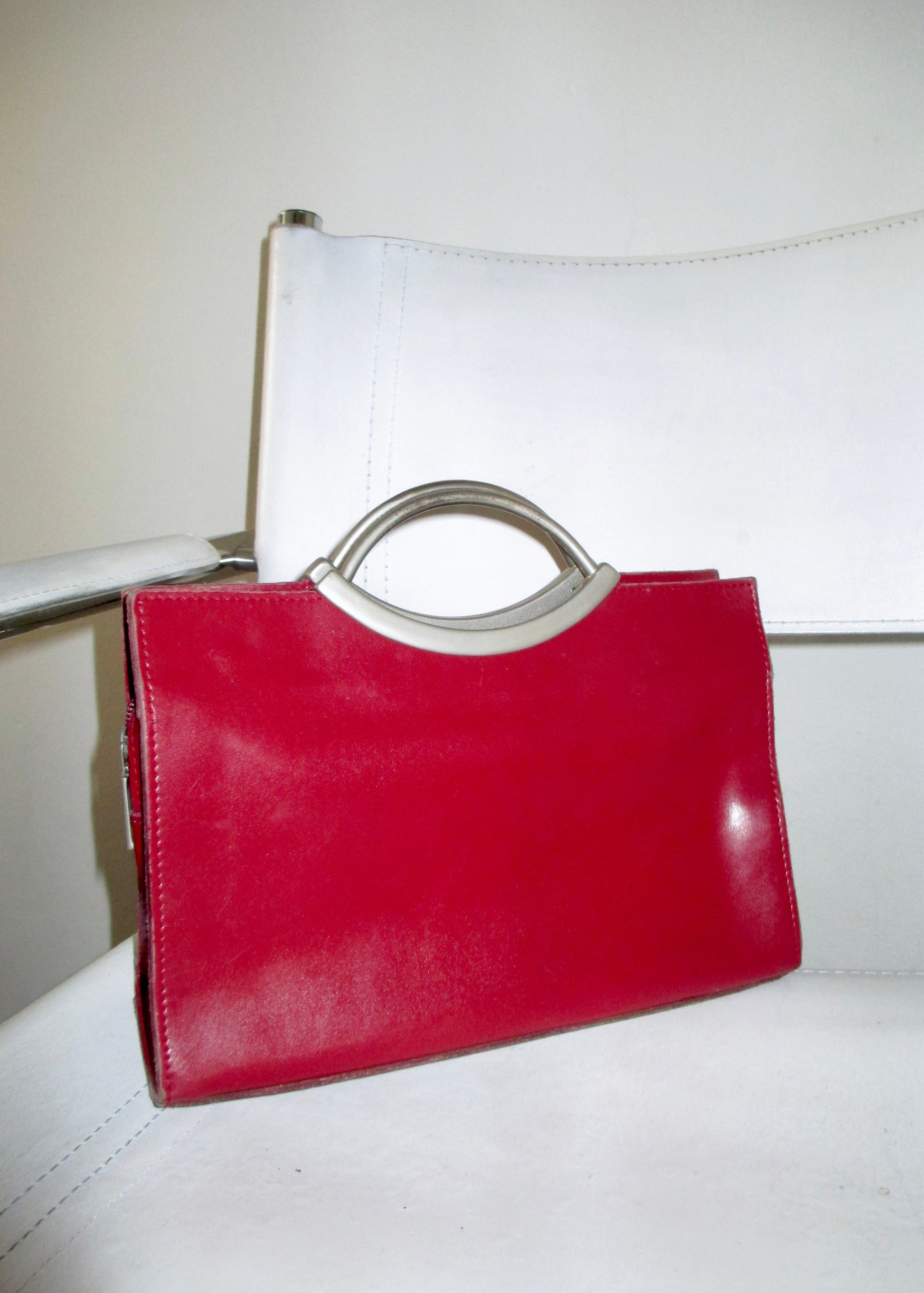 RED LEATHER BAG close up bauhaus chair vintage