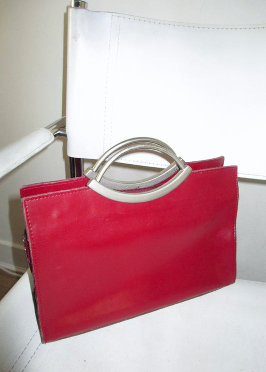 RED LEATHER BAG close up bauhaus chair vintage chrome metal