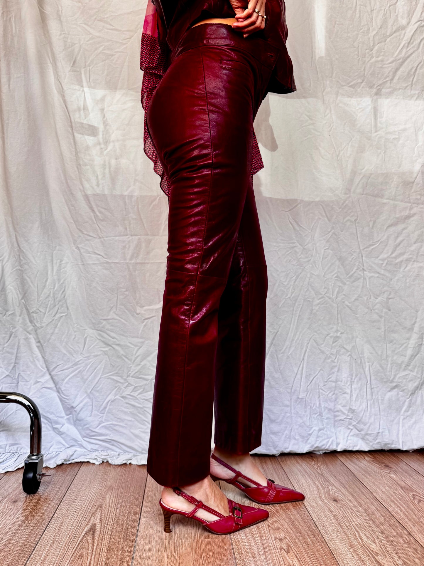 Red Leather Buffalo Trousers Close up Vintage with red leather kitten heels 