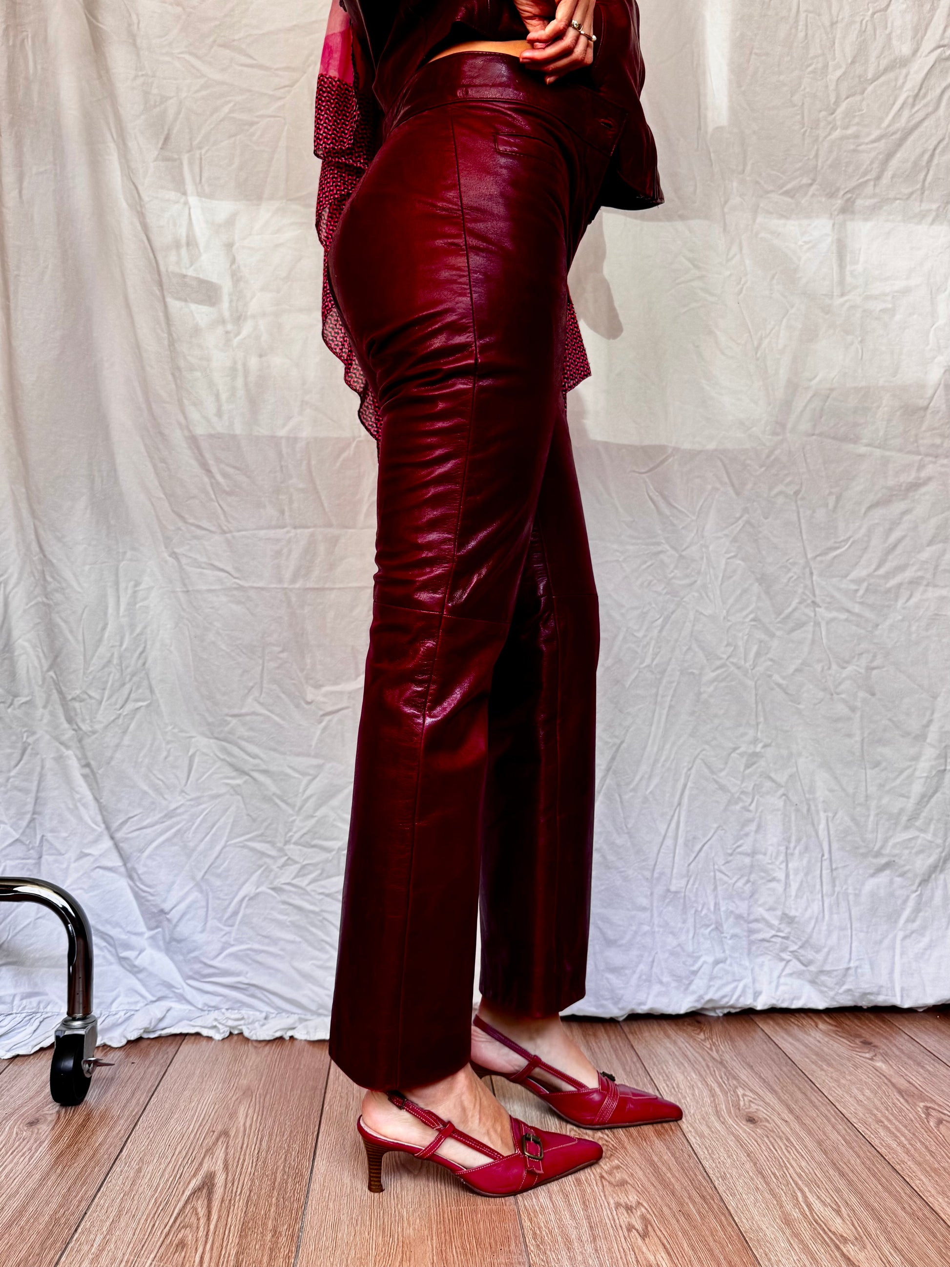 Red Leather Buffalo Trousers Close up Vintage with red leather kitten heels 