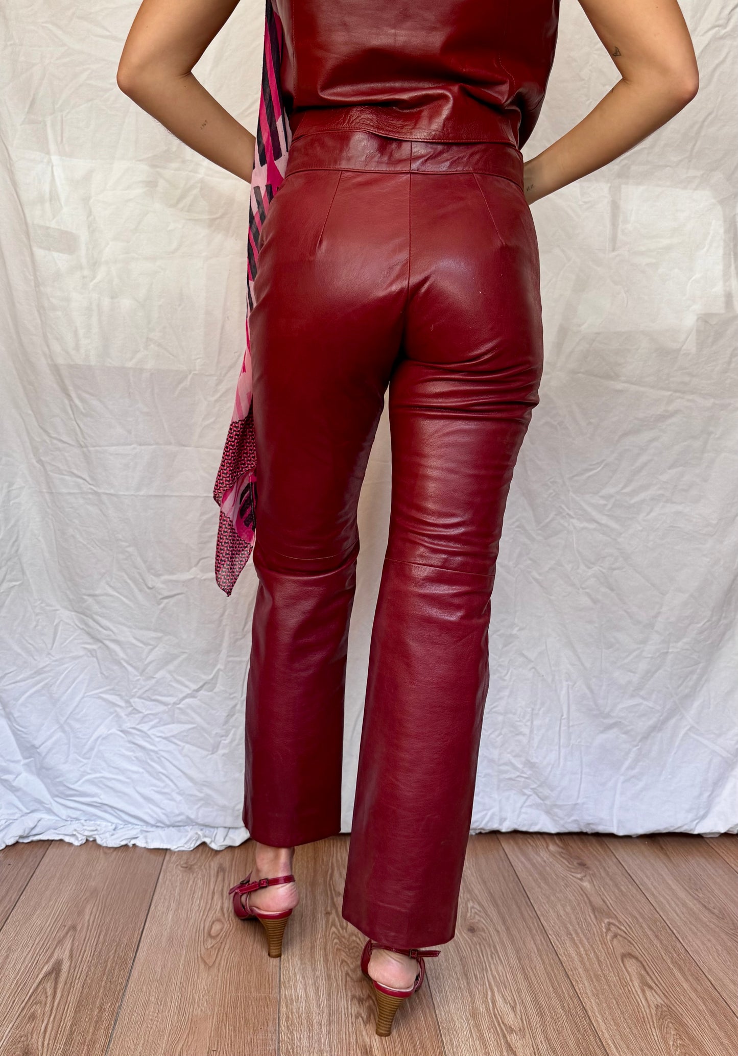 Red Leather Buffalo Trousers Close up Vintage with red leather kitten heels Back