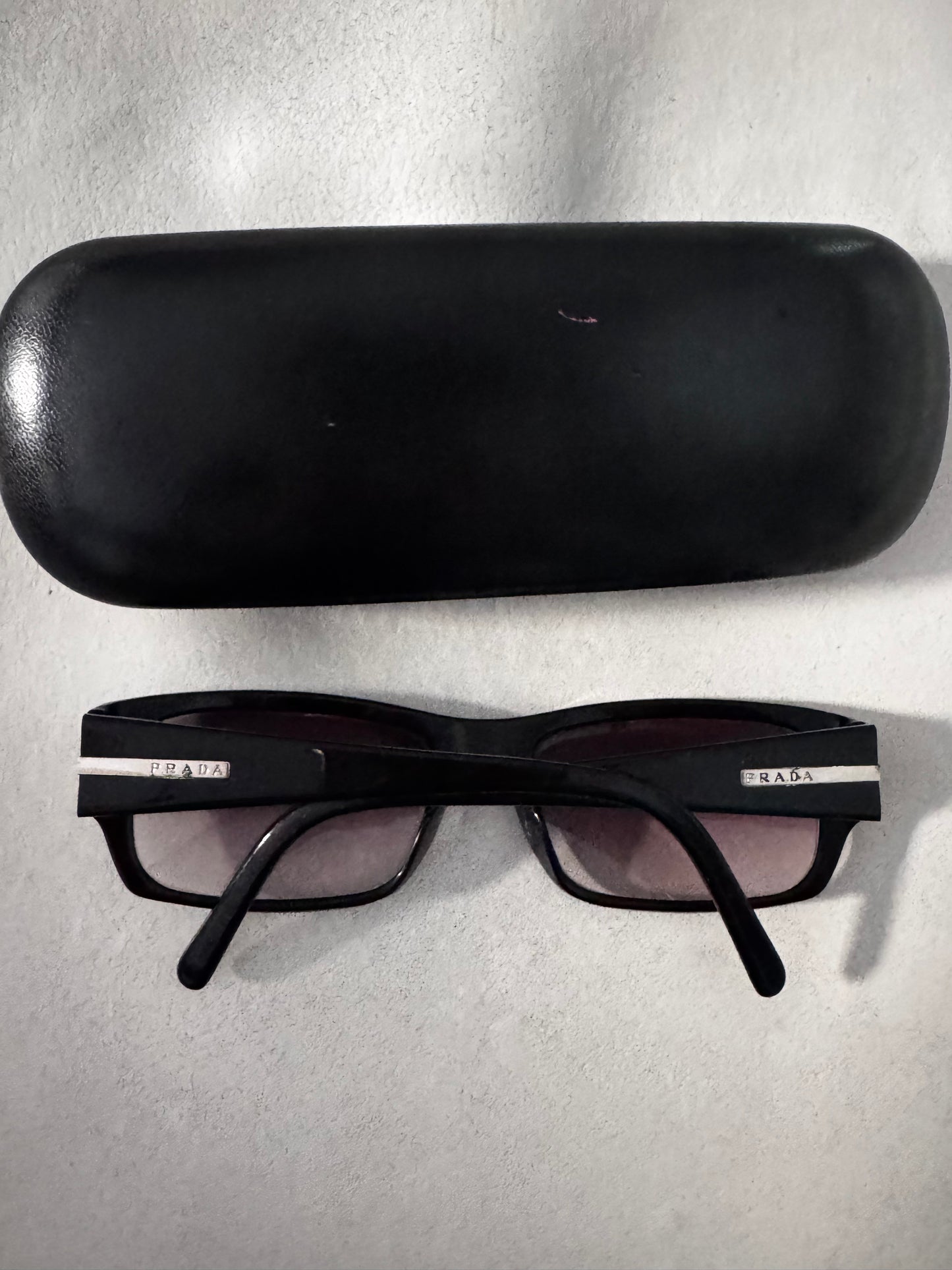 close up prada vintage designer sunglasses with case