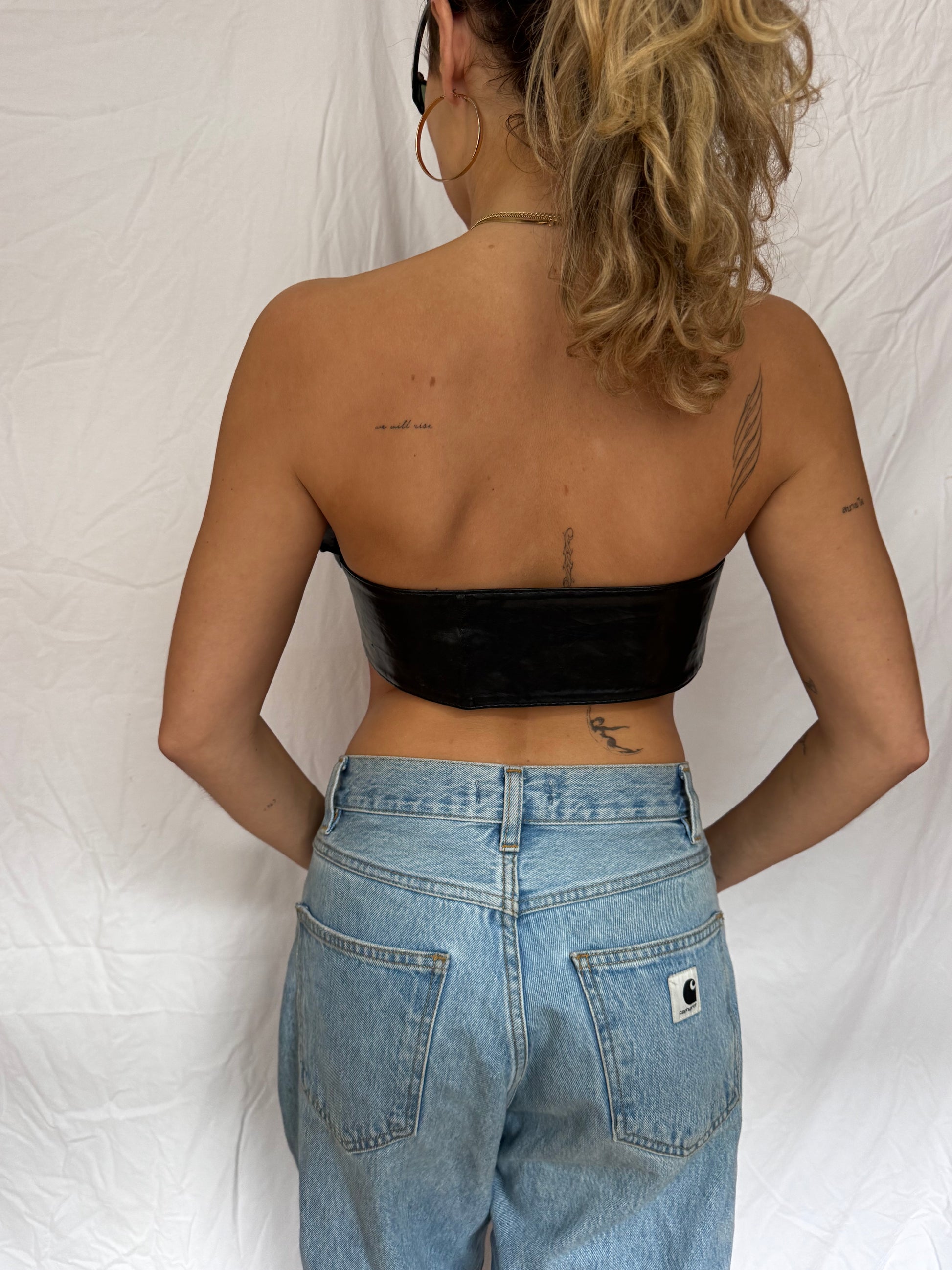 back leather belt carhart brandon jeans close up
