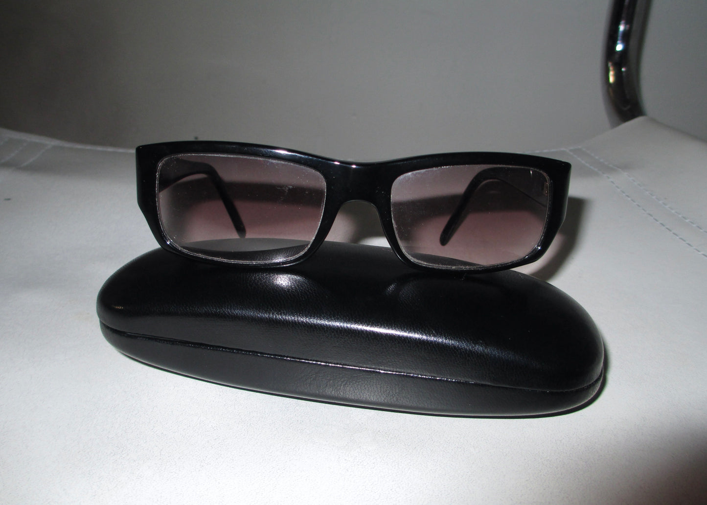 close up prada vintage designer sunglasses with case