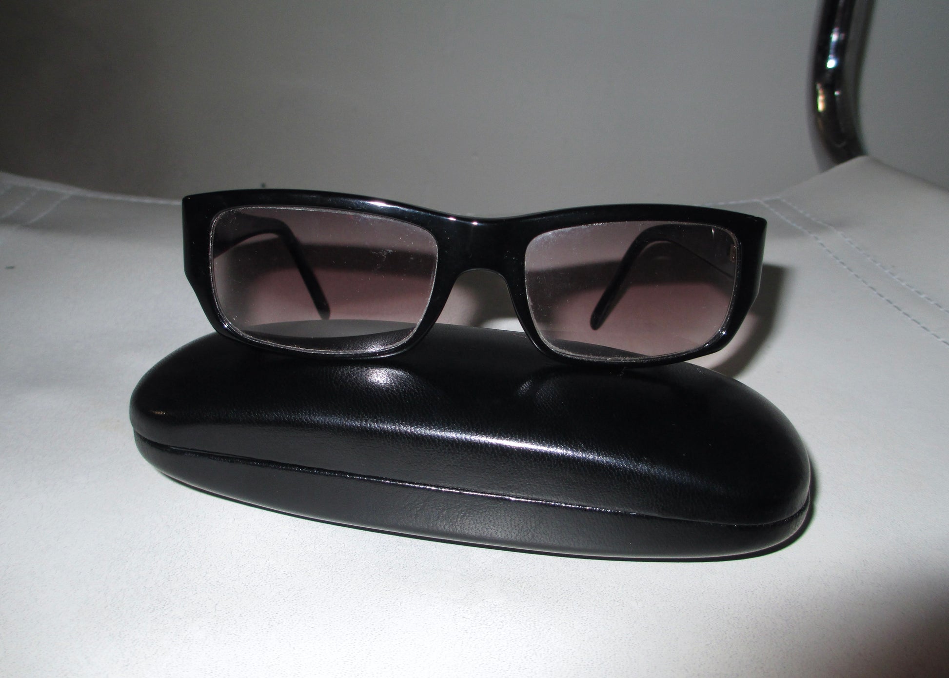 close up prada vintage designer sunglasses with case