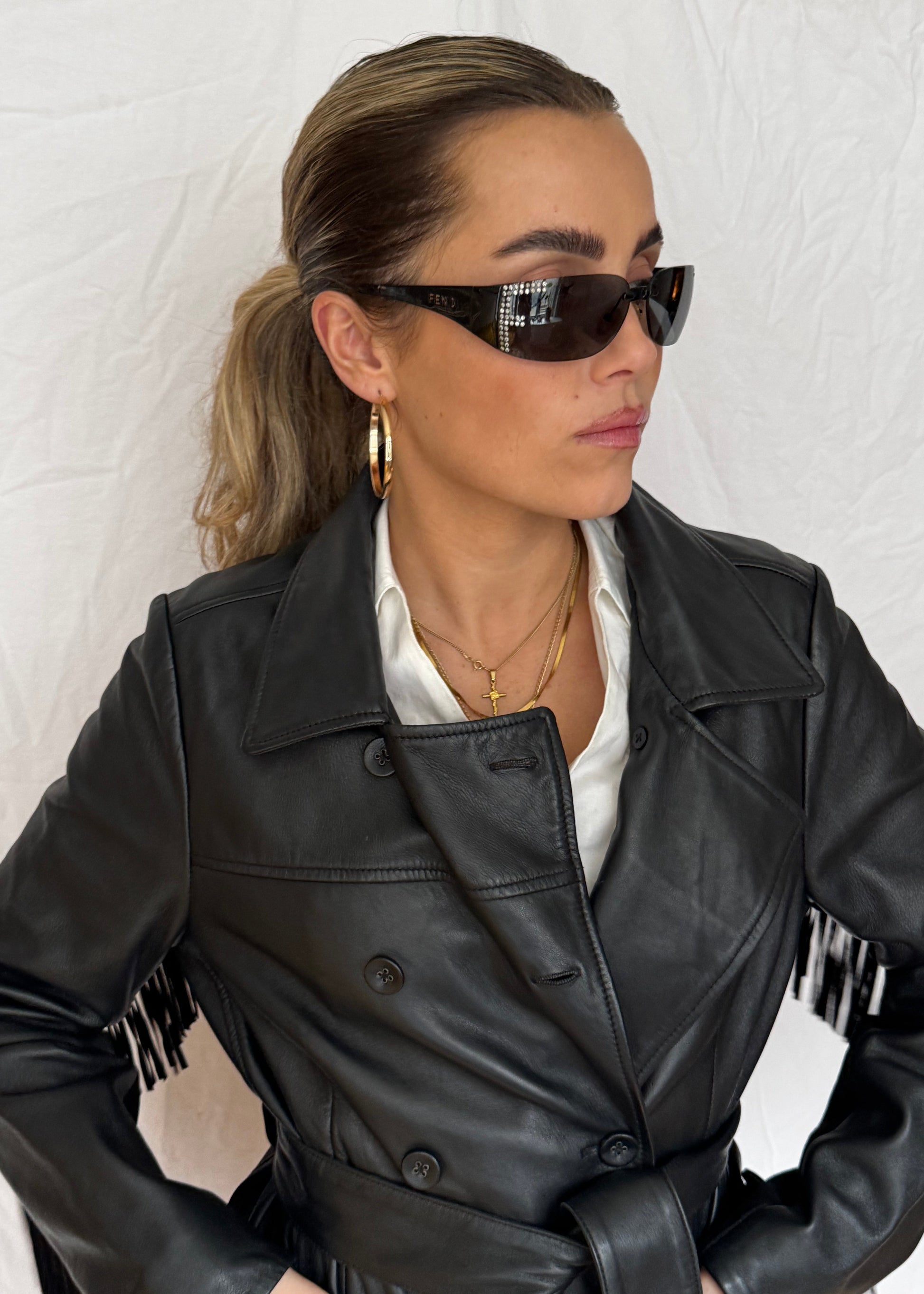 fendi vintage designer sunglasses 2yk with rhinestones gold jewerly black leather fringe coat