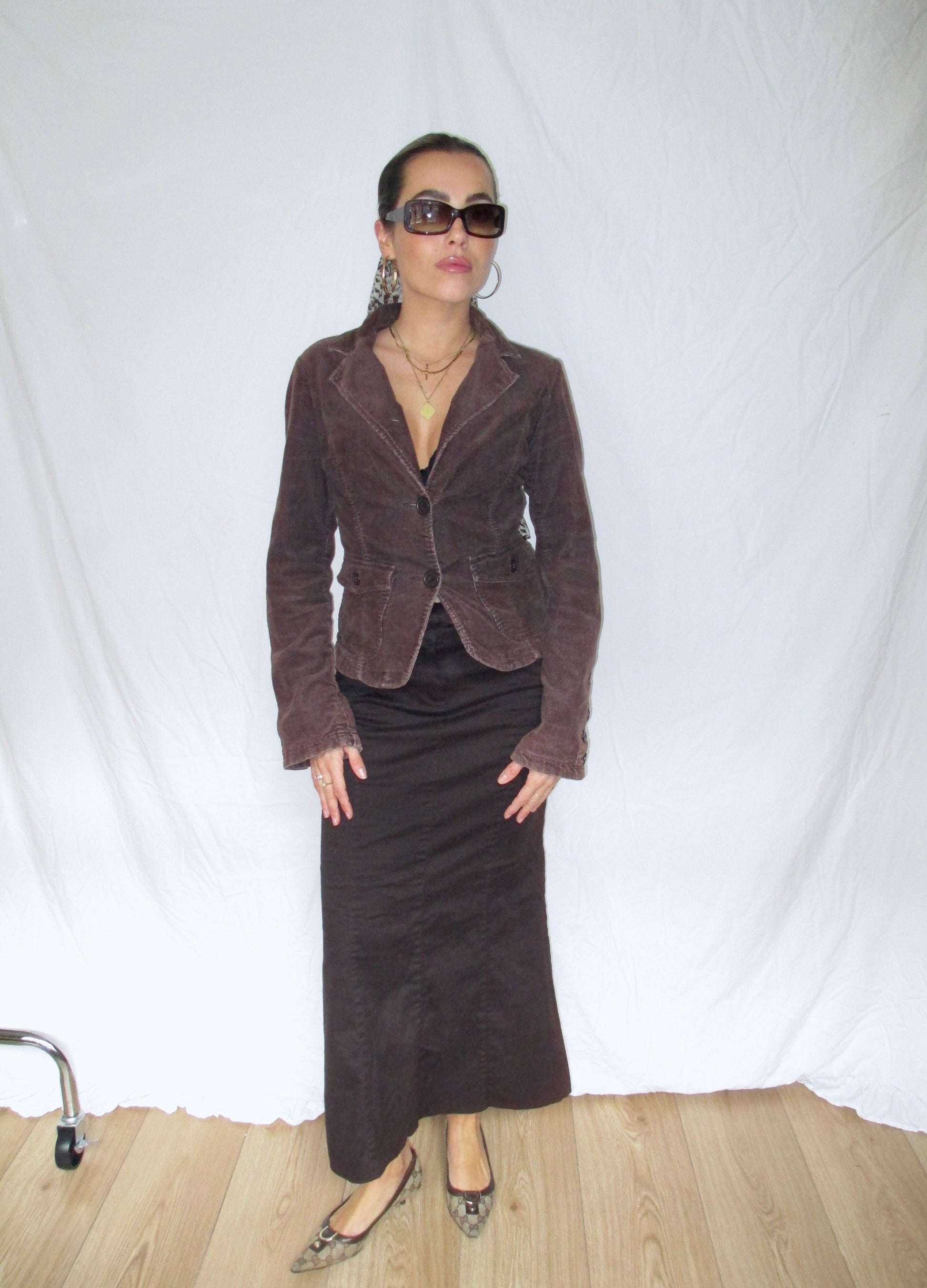 Brown maxi skirt with a clean, flattering silhouette and side pockets vintage with brown blazer 2yk gucci shoes burberry glasses headscarf