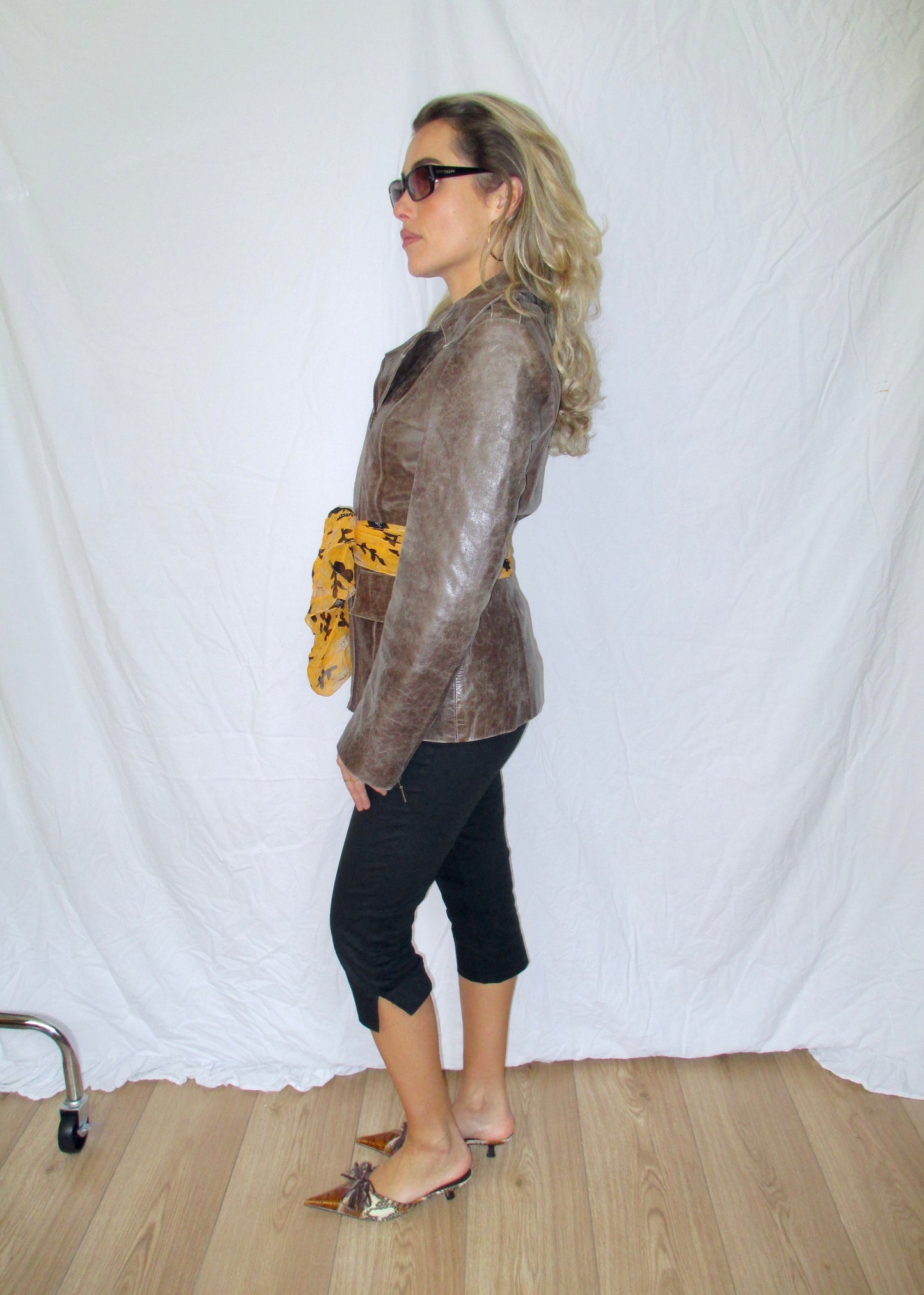Side split capri pants brown leather jacket belt scarf vintage tiger leather kitten heels 2yk outfit prada sunglasses
